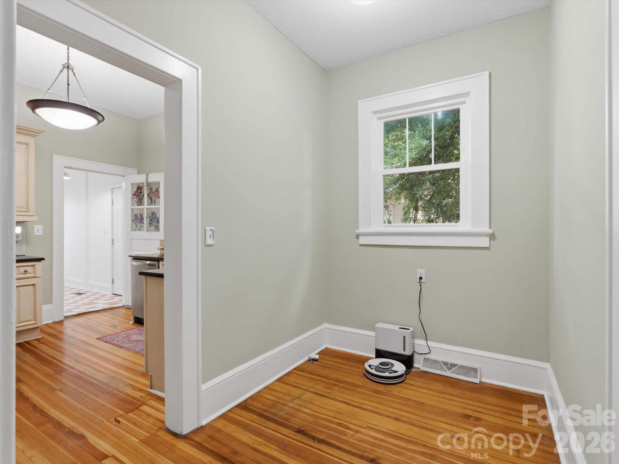 Open Butlers pantry between kitchen and Dining Room. - 707 York Street, Gastonia