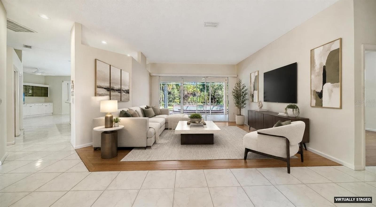 Virtually staged living room - 9488 HAWKSMOOR LN, SARASOTA