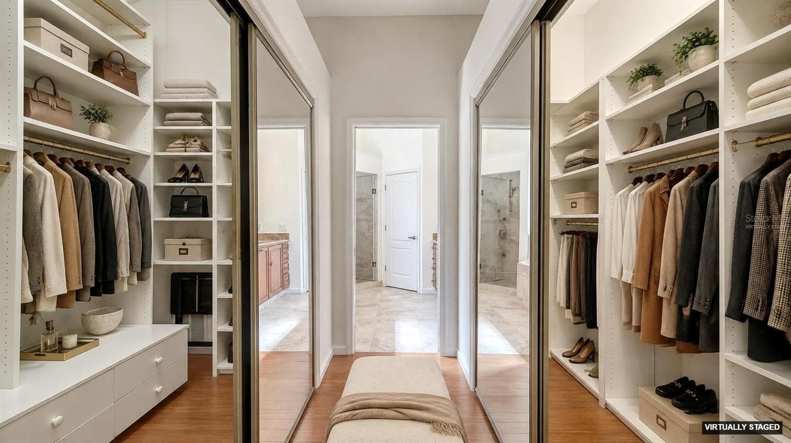 Virtually staged primary bedroom walk in closets - 9488 HAWKSMOOR LN, SARASOTA