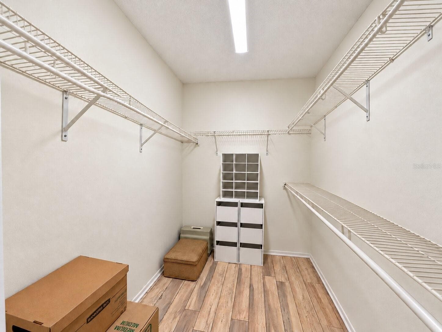 Spacious primary walk-in closet - 5808 GARDEN LAKES FERN, BRADENTON