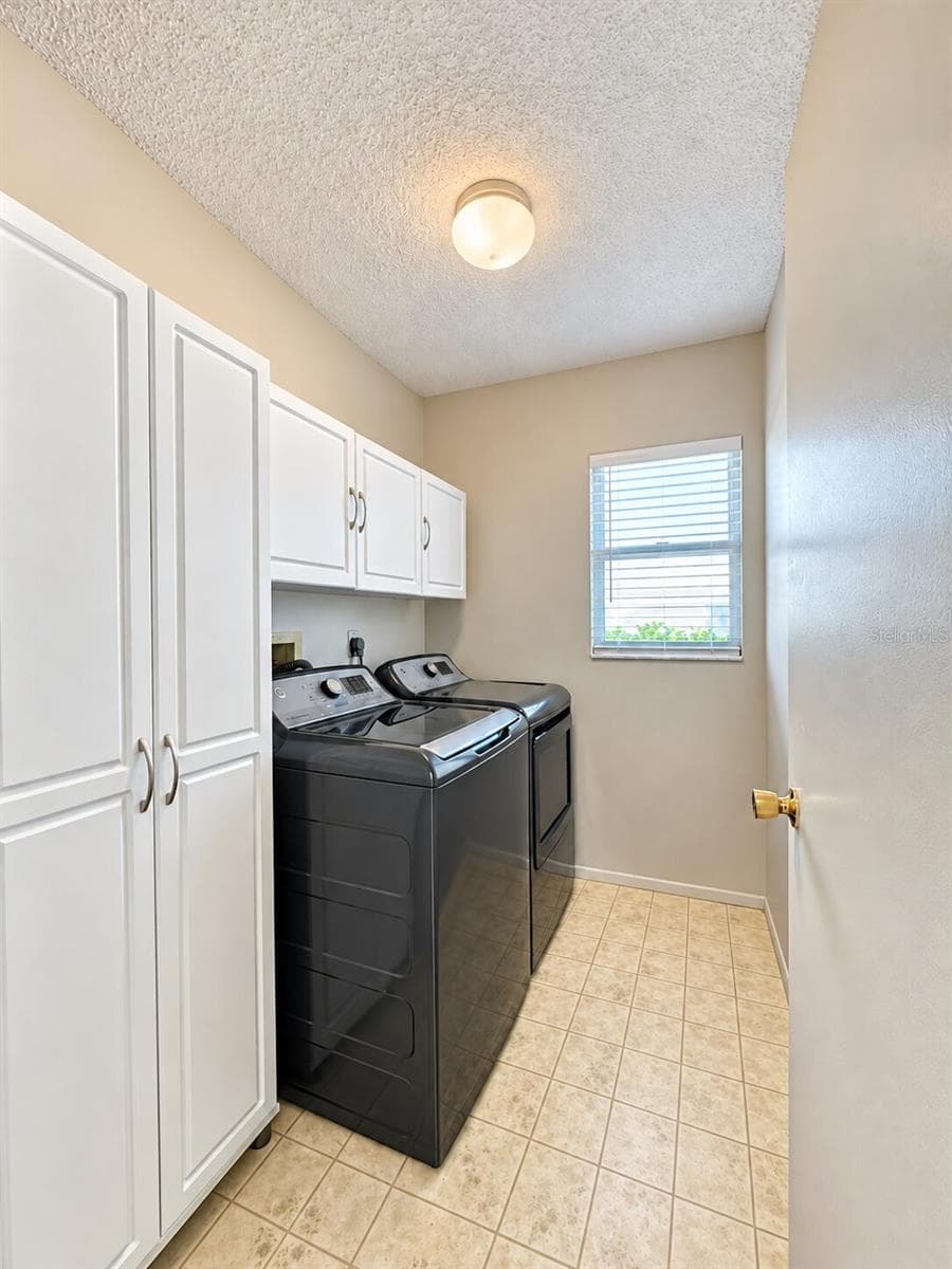 Convenient interior laundry room - 5808 GARDEN LAKES FERN, BRADENTON