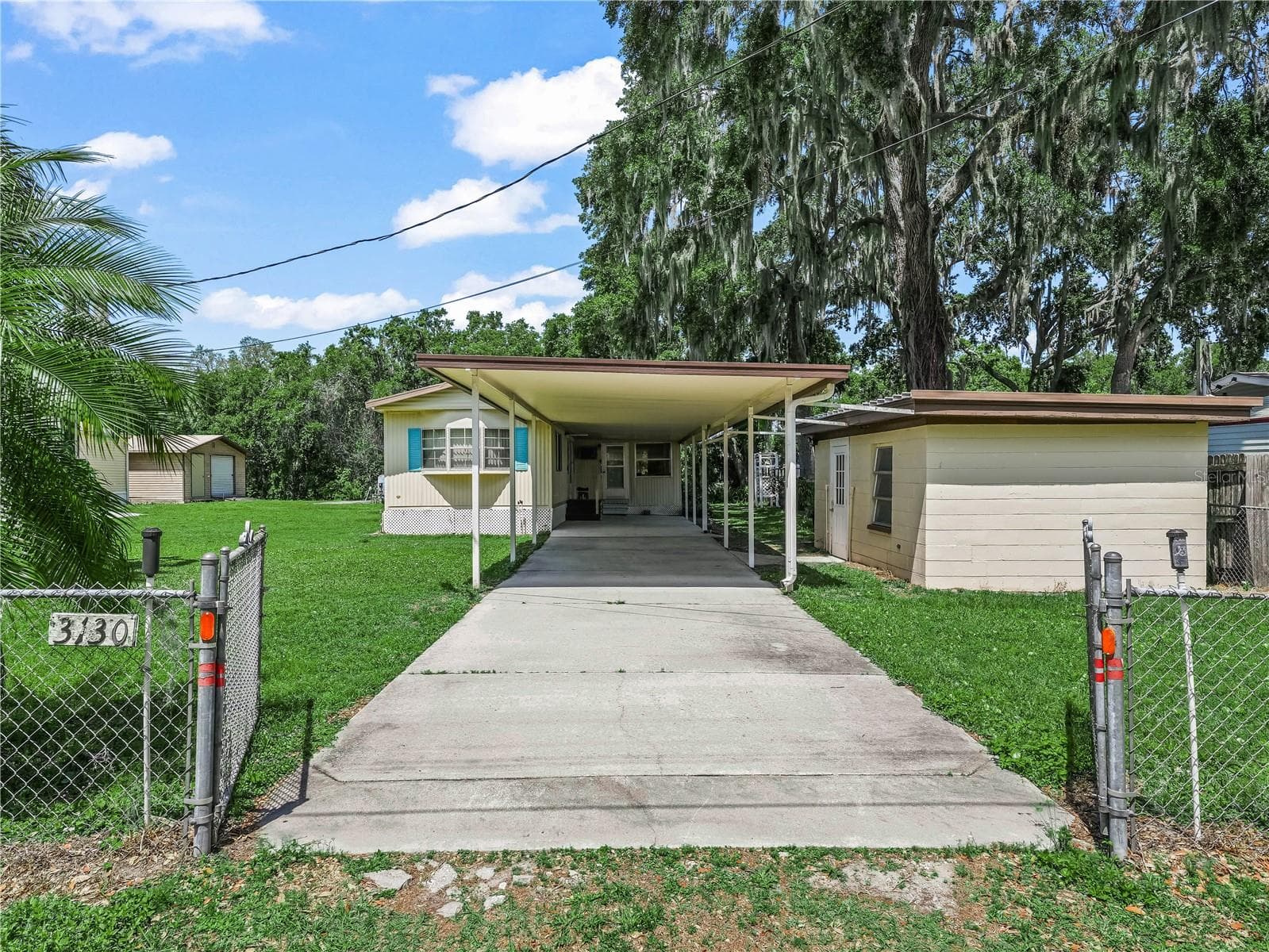Manufactured Home at 3130 N MARINA PKWY, LAKE WALES, photo 2 of 44