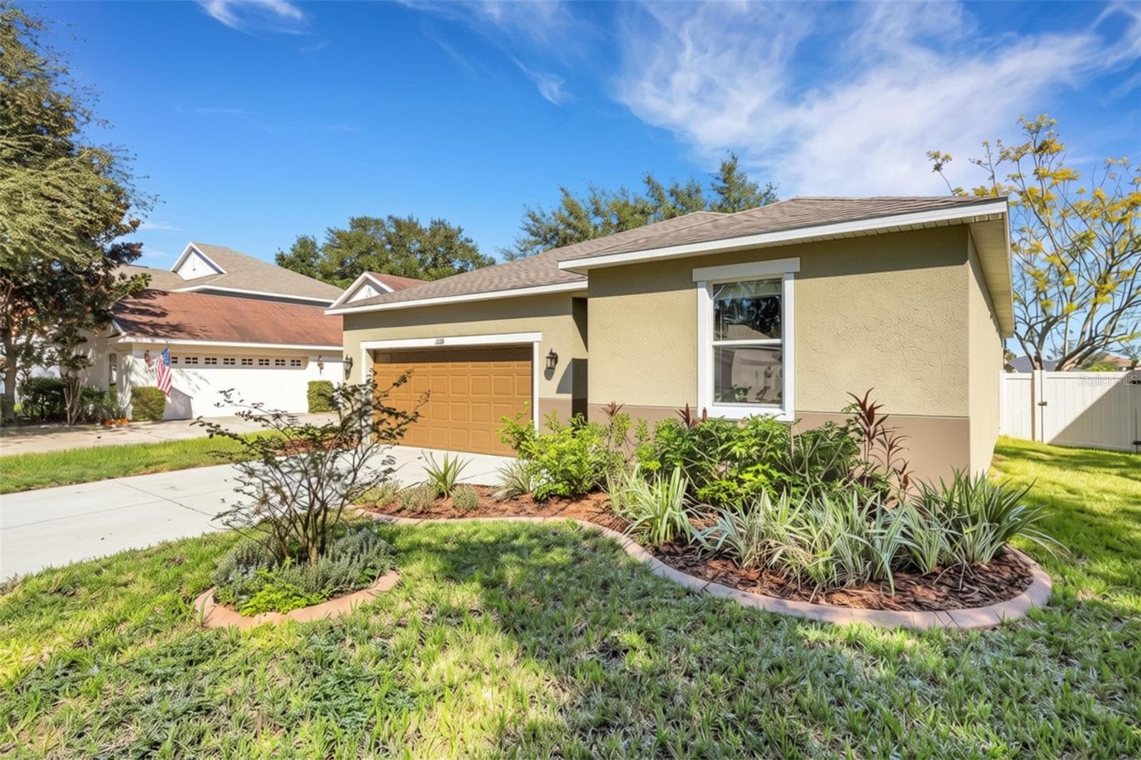 Tasteful Landscaping Lining the Pathway to the Front Entry - 11126 GOLDENROD FERN DR, RIVERVIEW