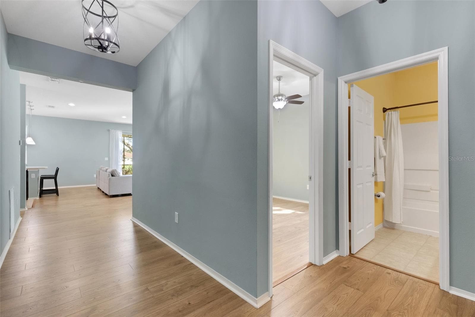 Front Entryway/Foyer & Hallway Extending to Main Living/Dining Room & Kitchen - 11126 GOLDENROD FERN DR, RIVERVIEW