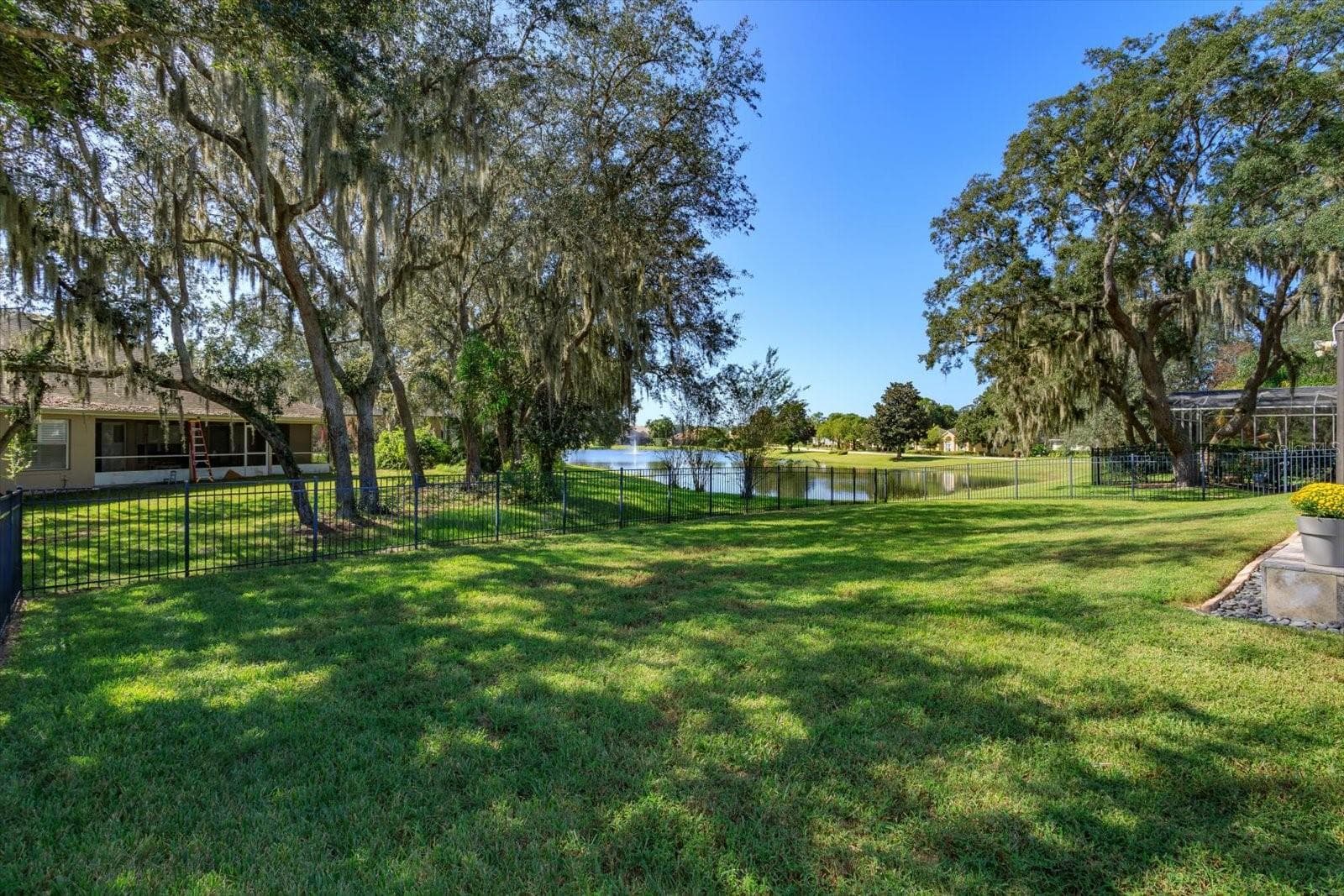 Large .34 acre lot overlooking pond with fountain - 6887 HIDDEN GLADE PL, SANFORD
