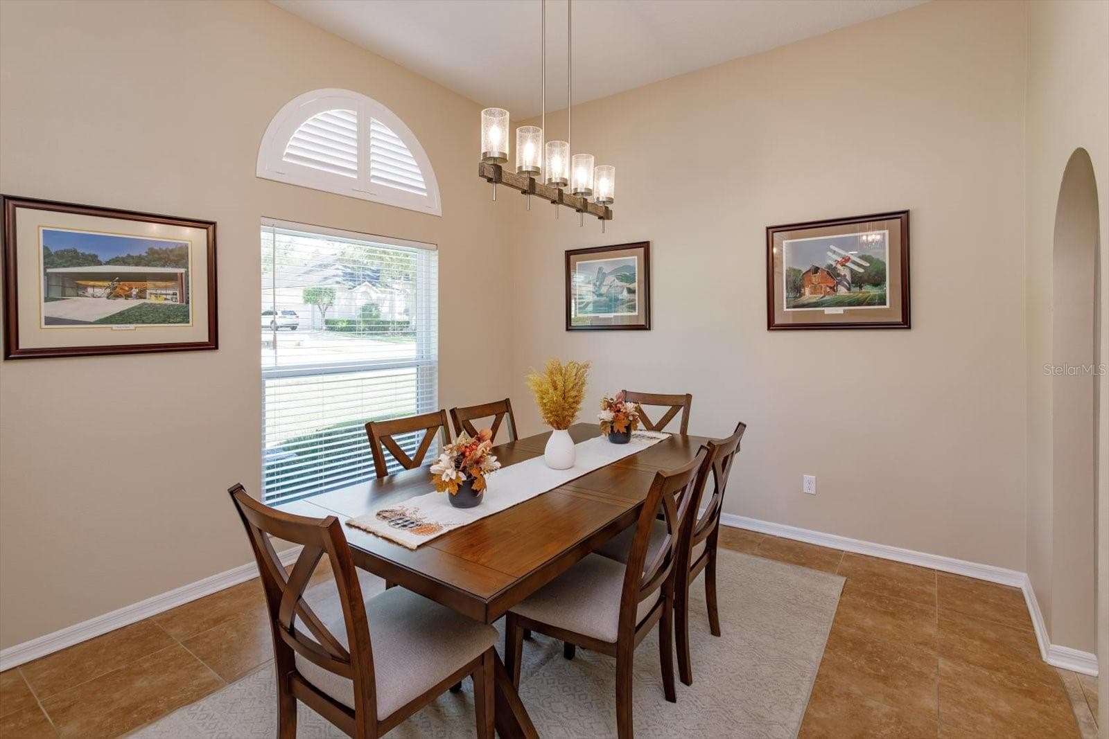 Freshly painted formal dining room with new fixture and new window - 6887 HIDDEN GLADE PL, SANFORD