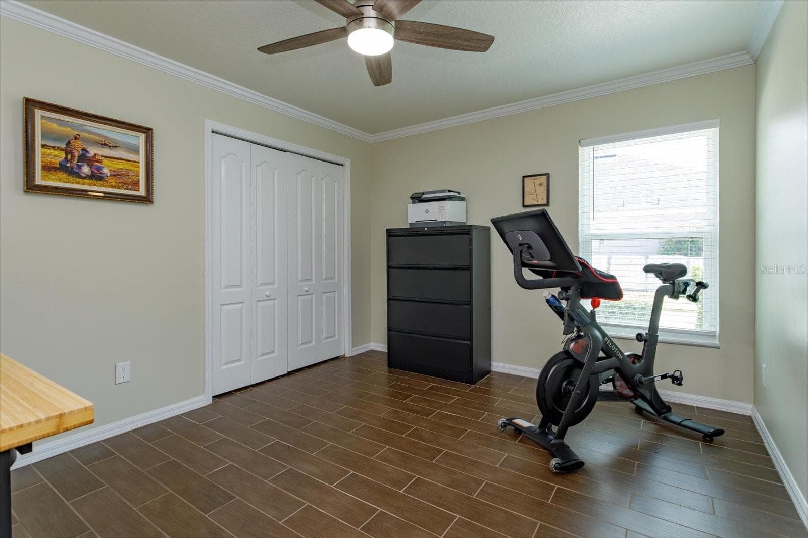 Freshly painted bedroom 3 features new fan, new blinds and wood look tile floors - 6887 HIDDEN GLADE PL, SANFORD