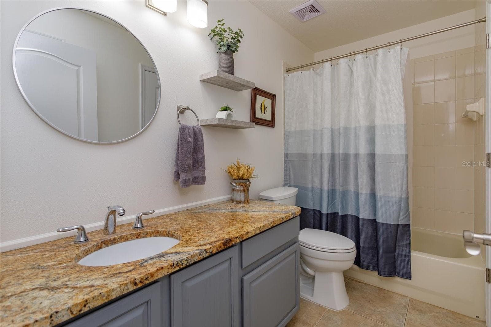 Updated guest bathroom with granite counters - 6887 HIDDEN GLADE PL, SANFORD