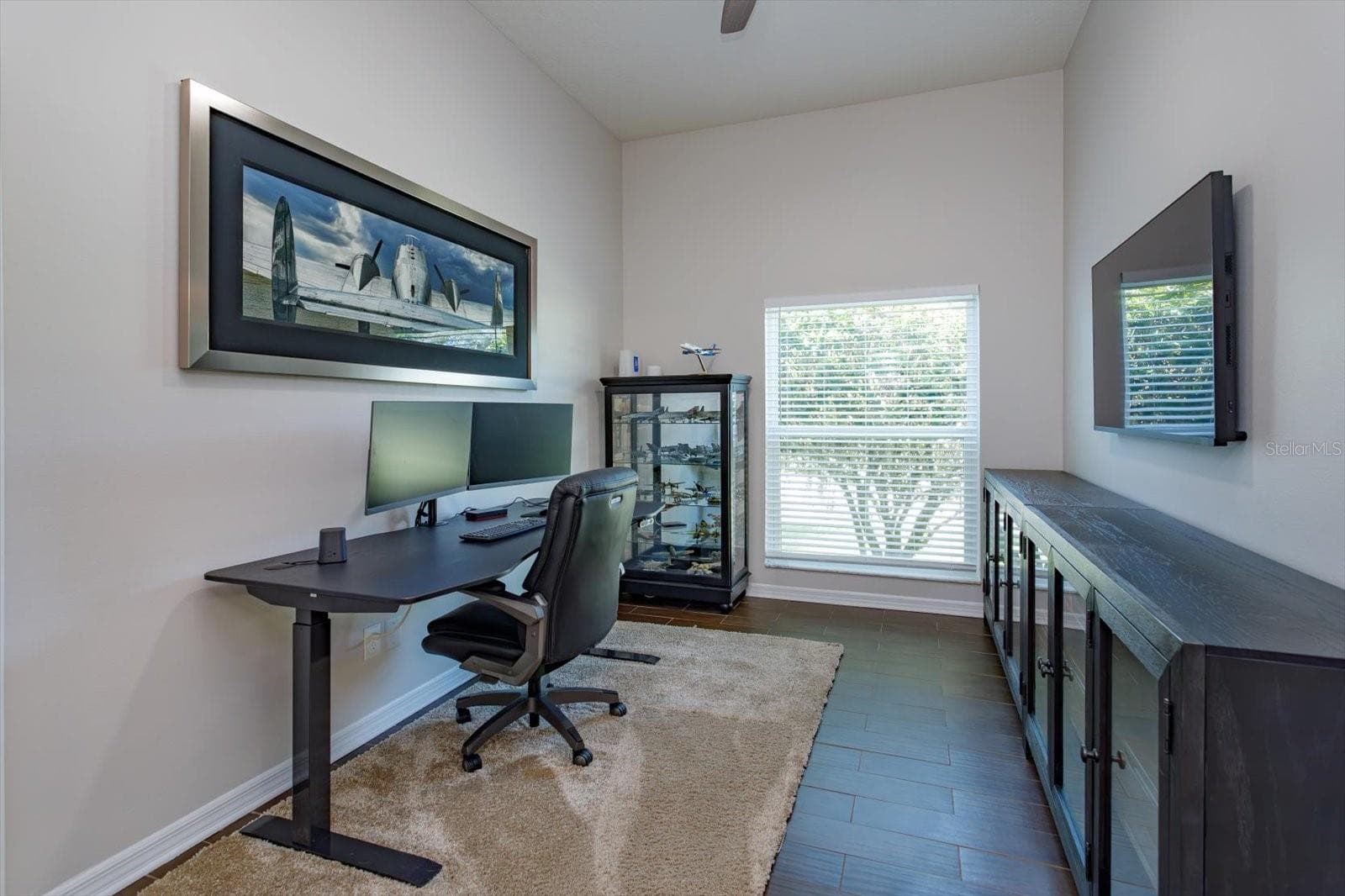 Freshly painted bedroom 4 with new blinds, new fan and wood look tile floors - 6887 HIDDEN GLADE PL, SANFORD
