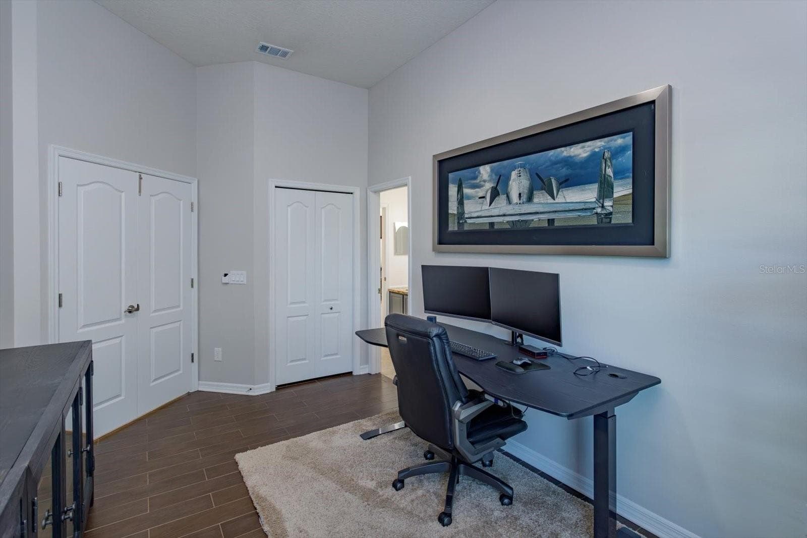 Bedroom 4 with double doors is a great office or bedroom with attached bathroom - 6887 HIDDEN GLADE PL, SANFORD