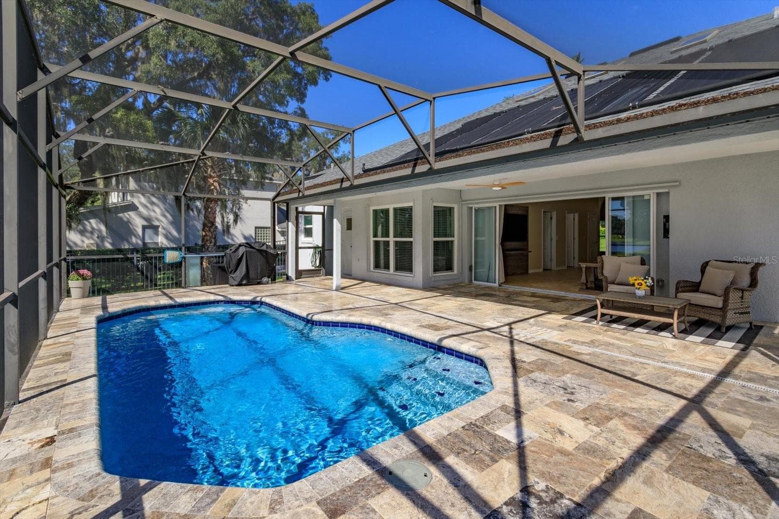 Header added to remove posts on porch for expansive open view - 6887 HIDDEN GLADE PL, SANFORD