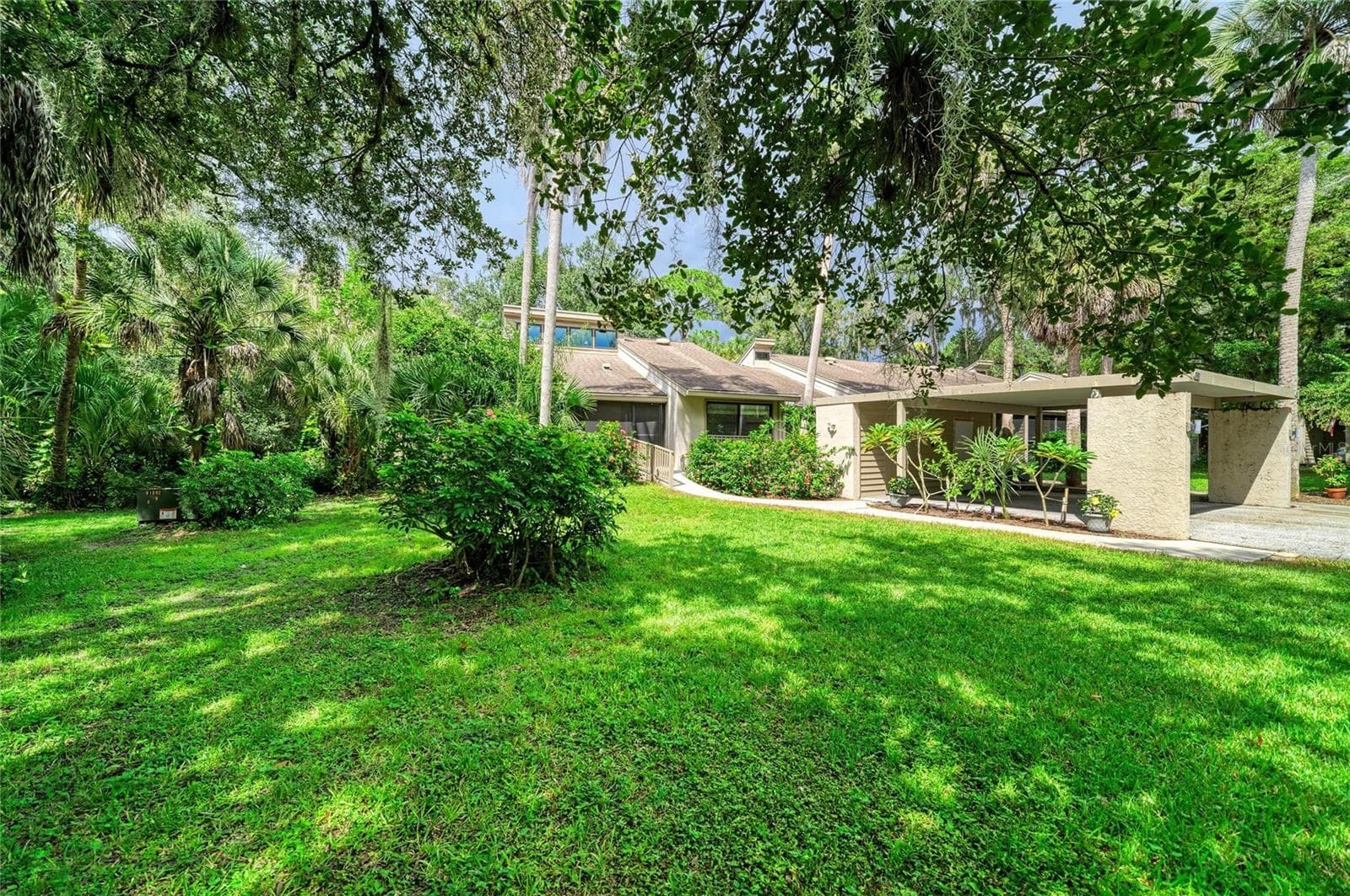 Private end unit surrounded by wooded area! - 2403 ARBORETUM CIR #29, SARASOTA