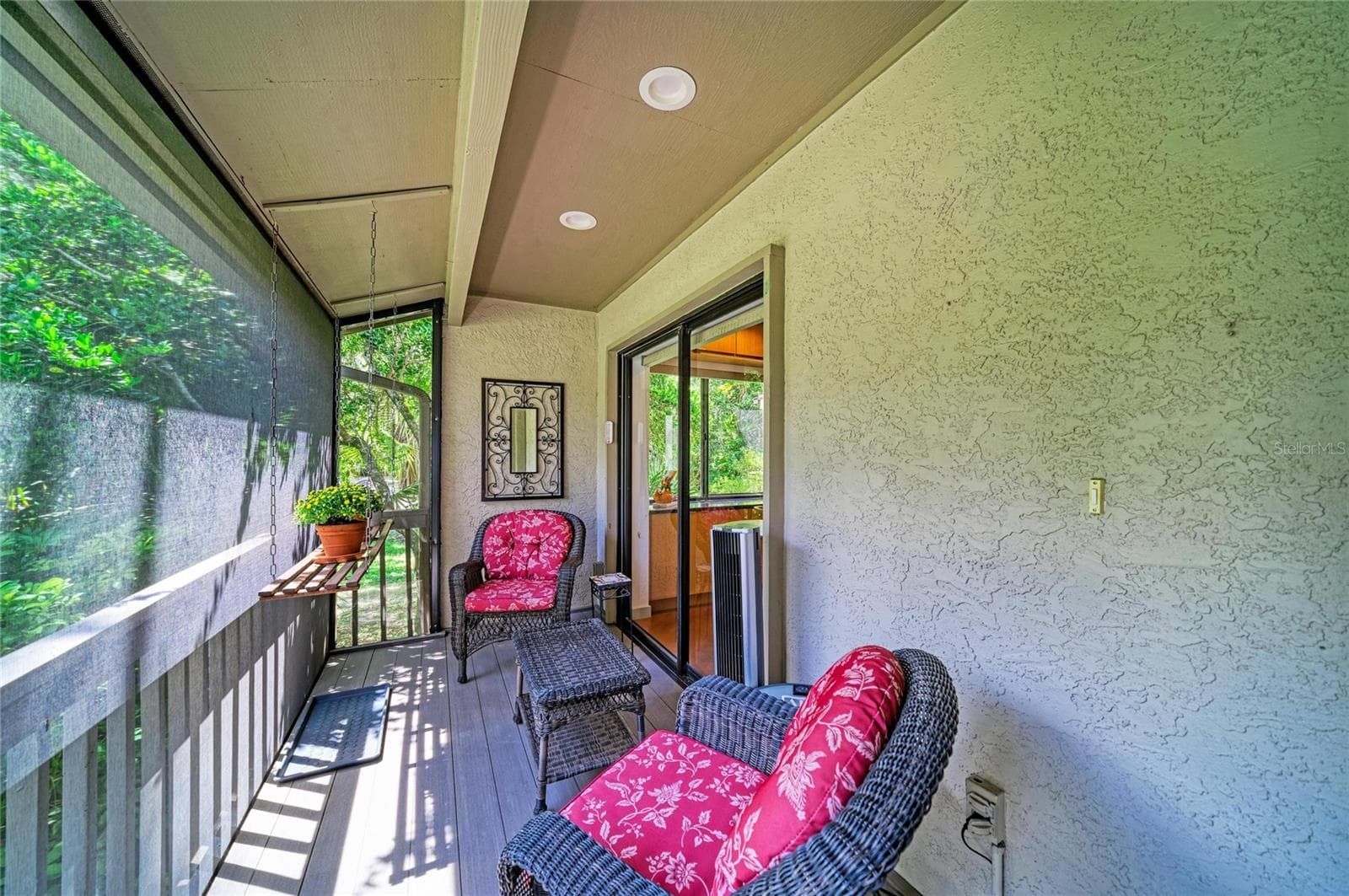 Charming screened front porch. Sliders into the kitchen. - 2403 ARBORETUM CIR #29, SARASOTA