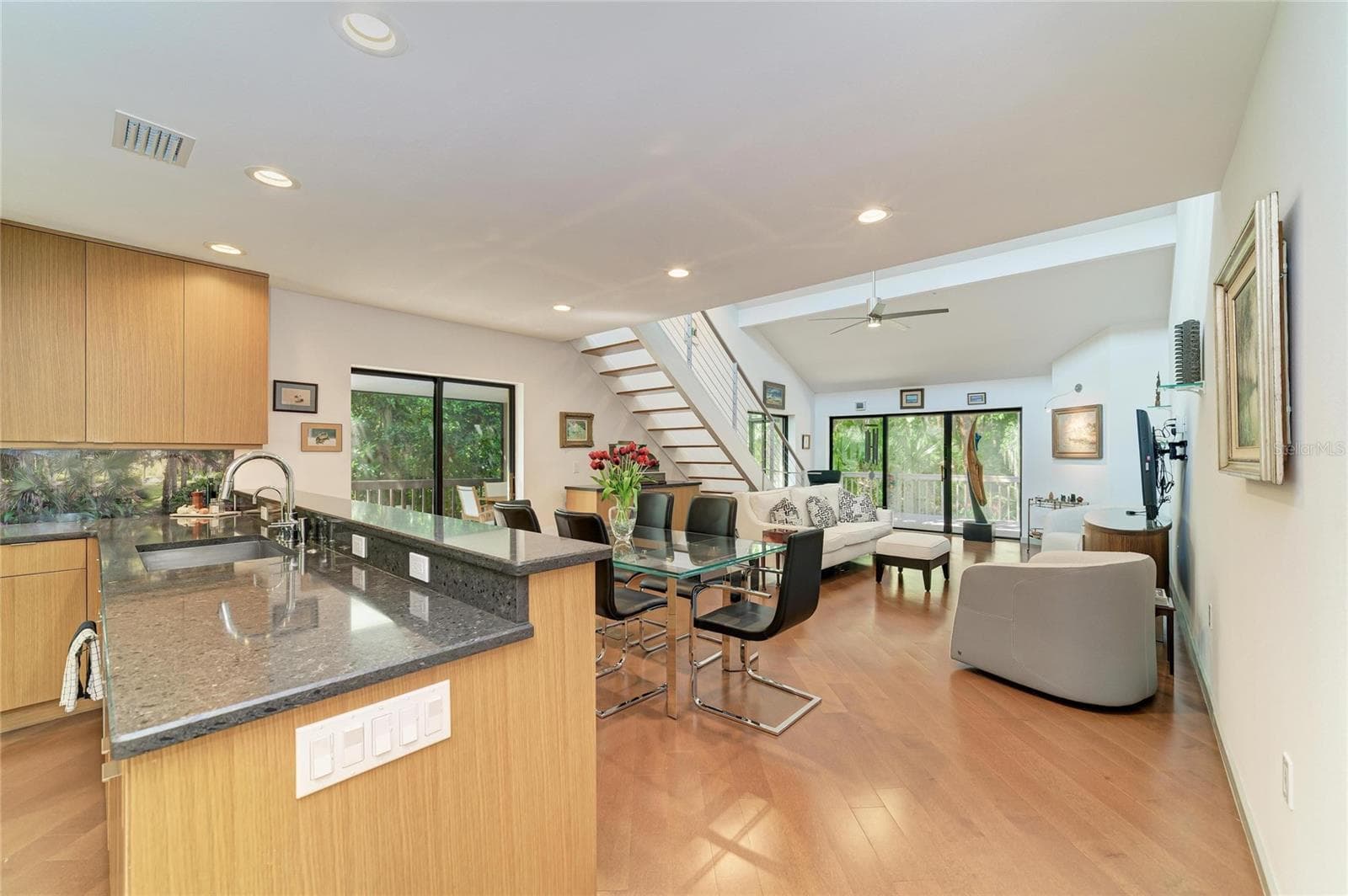As you walk in, kitchen to the left, bedrooms to the right. - 2403 ARBORETUM CIR #29, SARASOTA