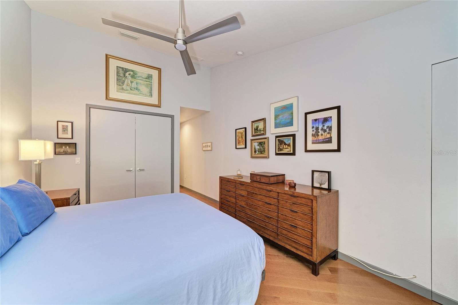There is a closet door to the left, next to the slider, that opens up where a tv was installed - 2403 ARBORETUM CIR #29, SARASOTA