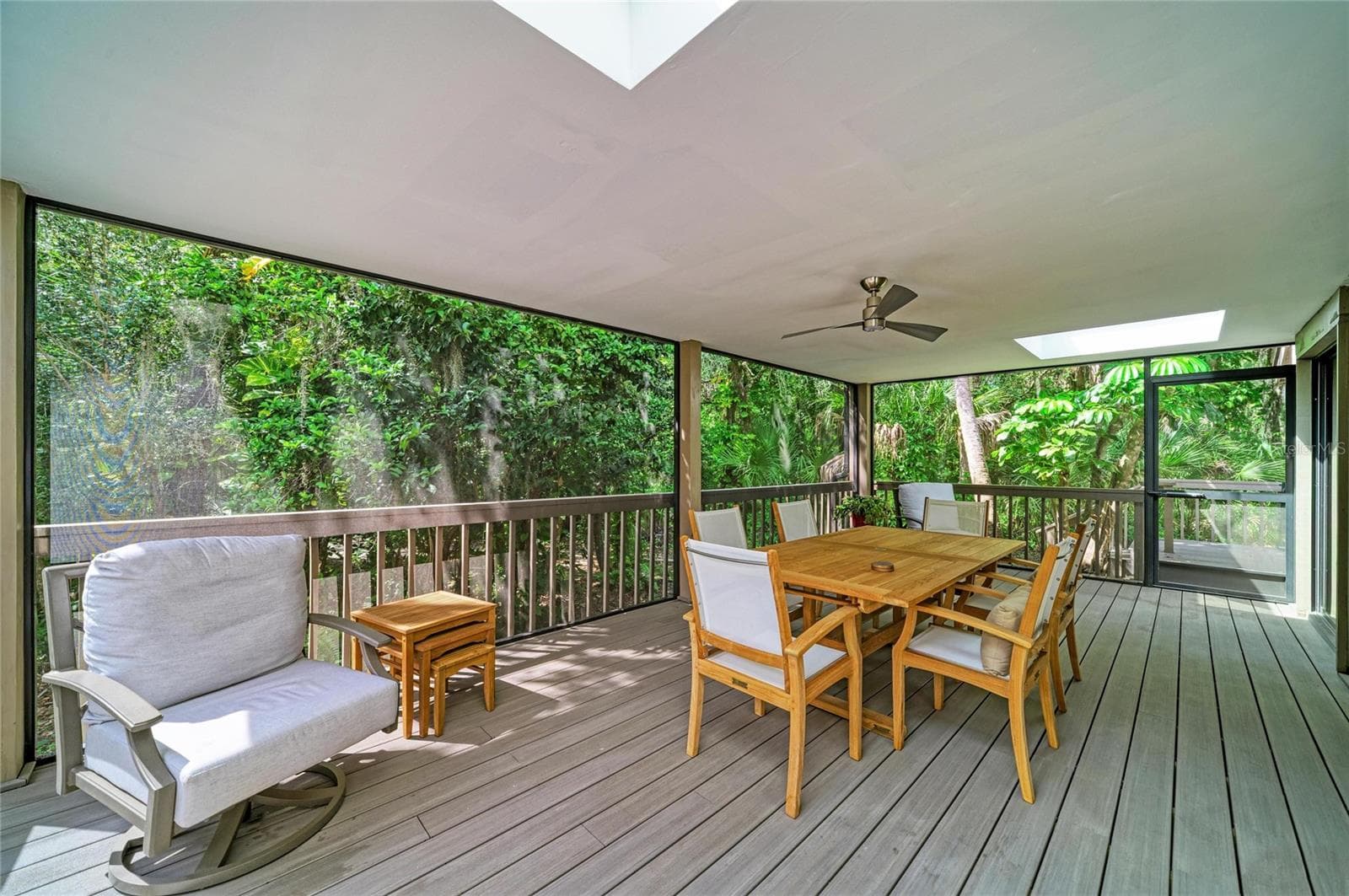 Covered & Screened lanai with skylights. Door goes to the open air deck. - 2403 ARBORETUM CIR #29, SARASOTA