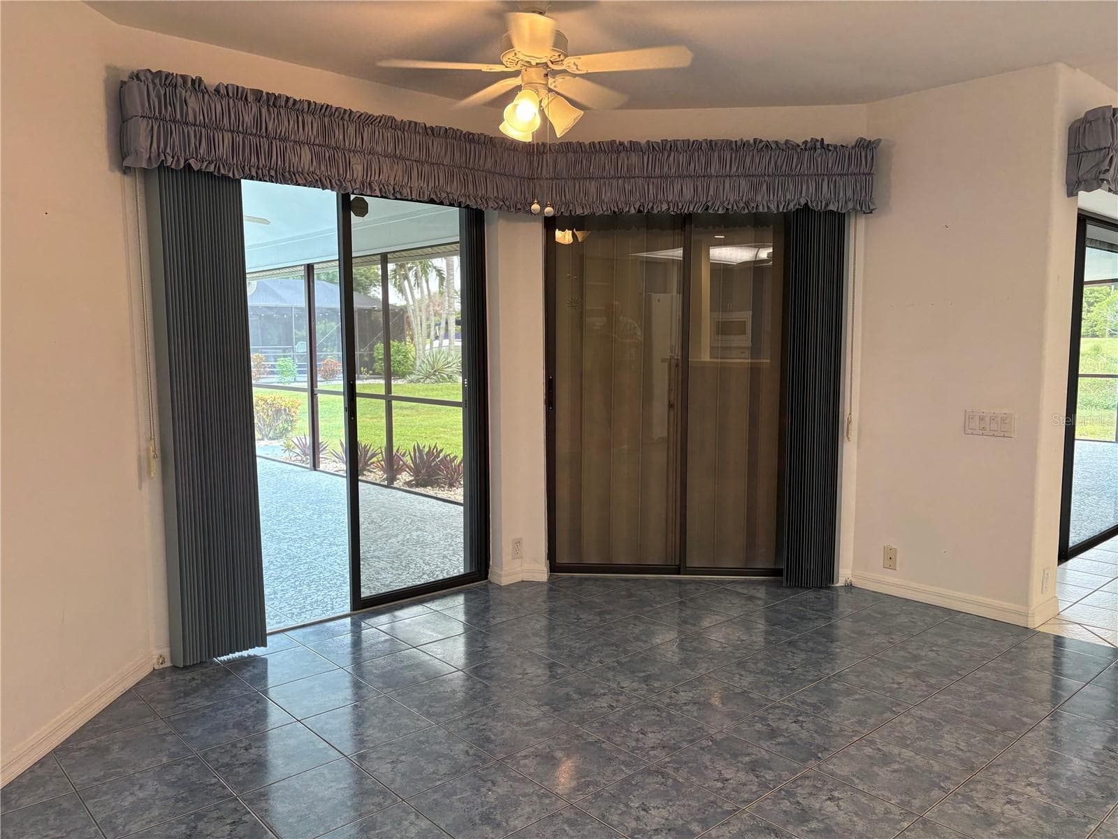 Family room towards Kitchen - 4328 COUNTRY CLUB BLVD, CAPE CORAL