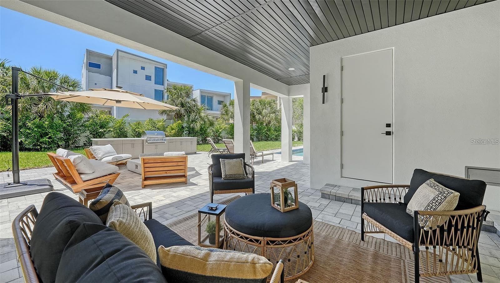 Ground level patio - 8800 MIDNIGHT PASS RD, SARASOTA