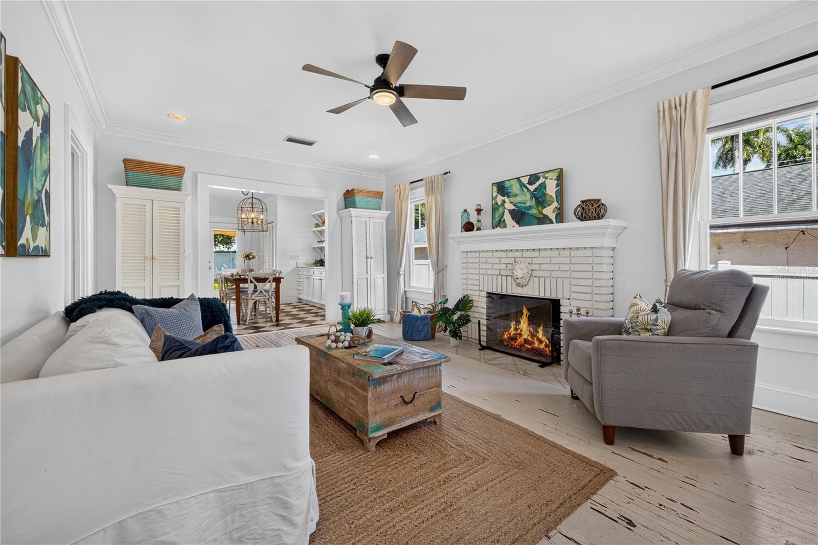 Living room (Fire in fireplace is virtually staged) - 2106 8TH AVE W, BRADENTON