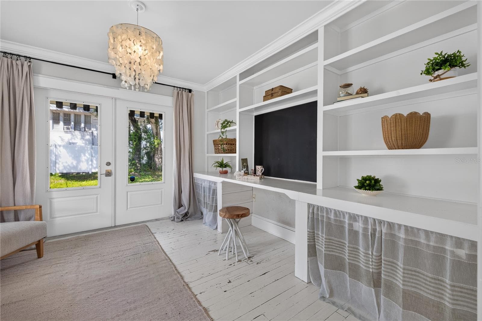 Built ins in the flex bedroom / office with doors to backyard - 2106 8TH AVE W, BRADENTON