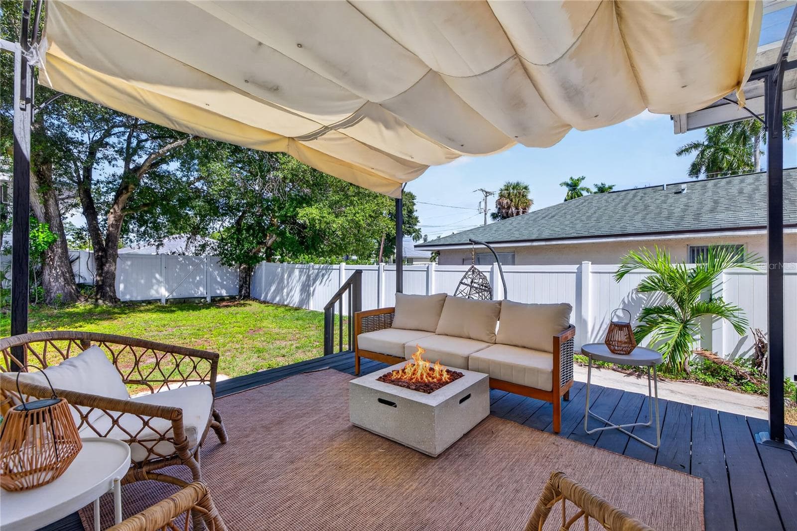 Back porch with newly fenced in backyard - 2106 8TH AVE W, BRADENTON