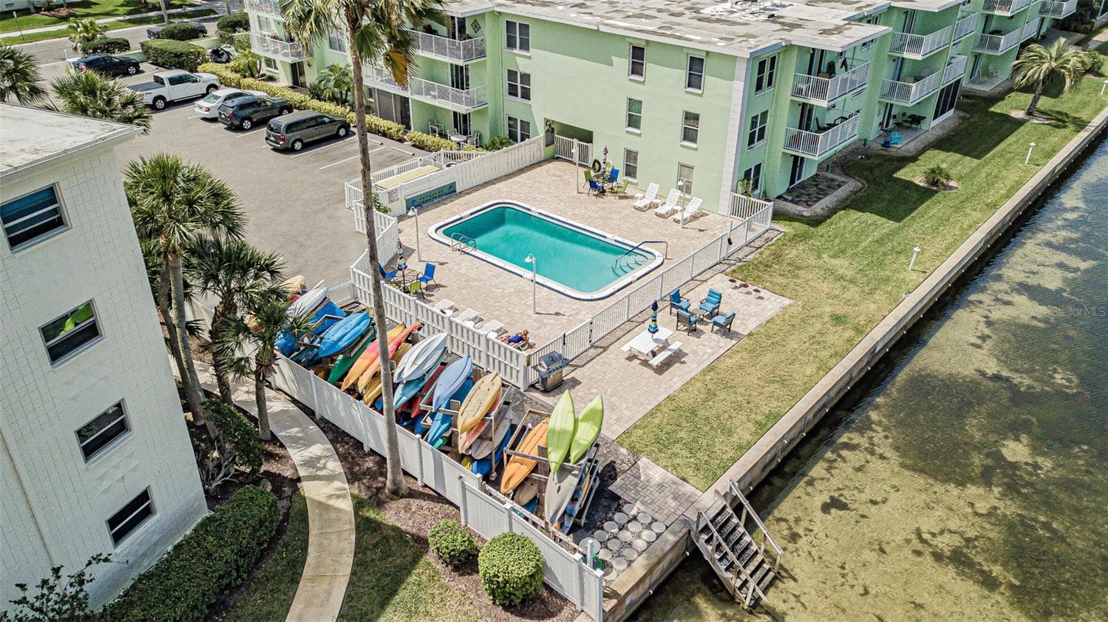 Heated community pool onlooking St. Joseph's Sound - 464 PAULA DR N #116, DUNEDIN