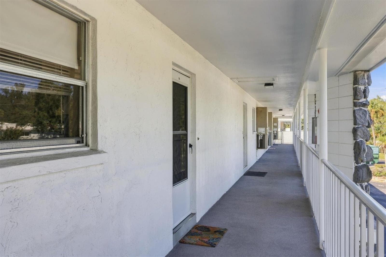 covered porch entry - 3950 ROXANE BLVD #3B, SARASOTA