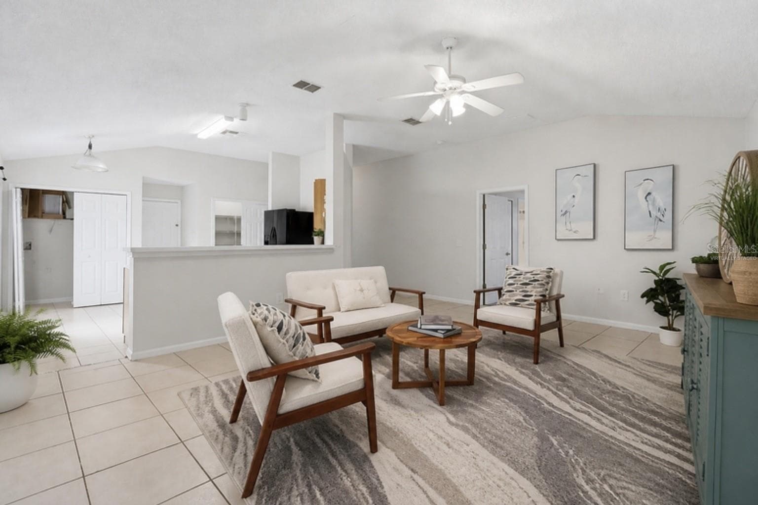 Virtually staged with the home's actual furniture - living room - 3 LOUVET LN, PALM COAST