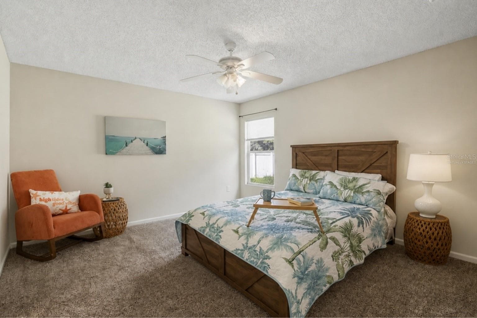 Virtually staged with the home's actual furniture - primary bedroom - 3 LOUVET LN, PALM COAST
