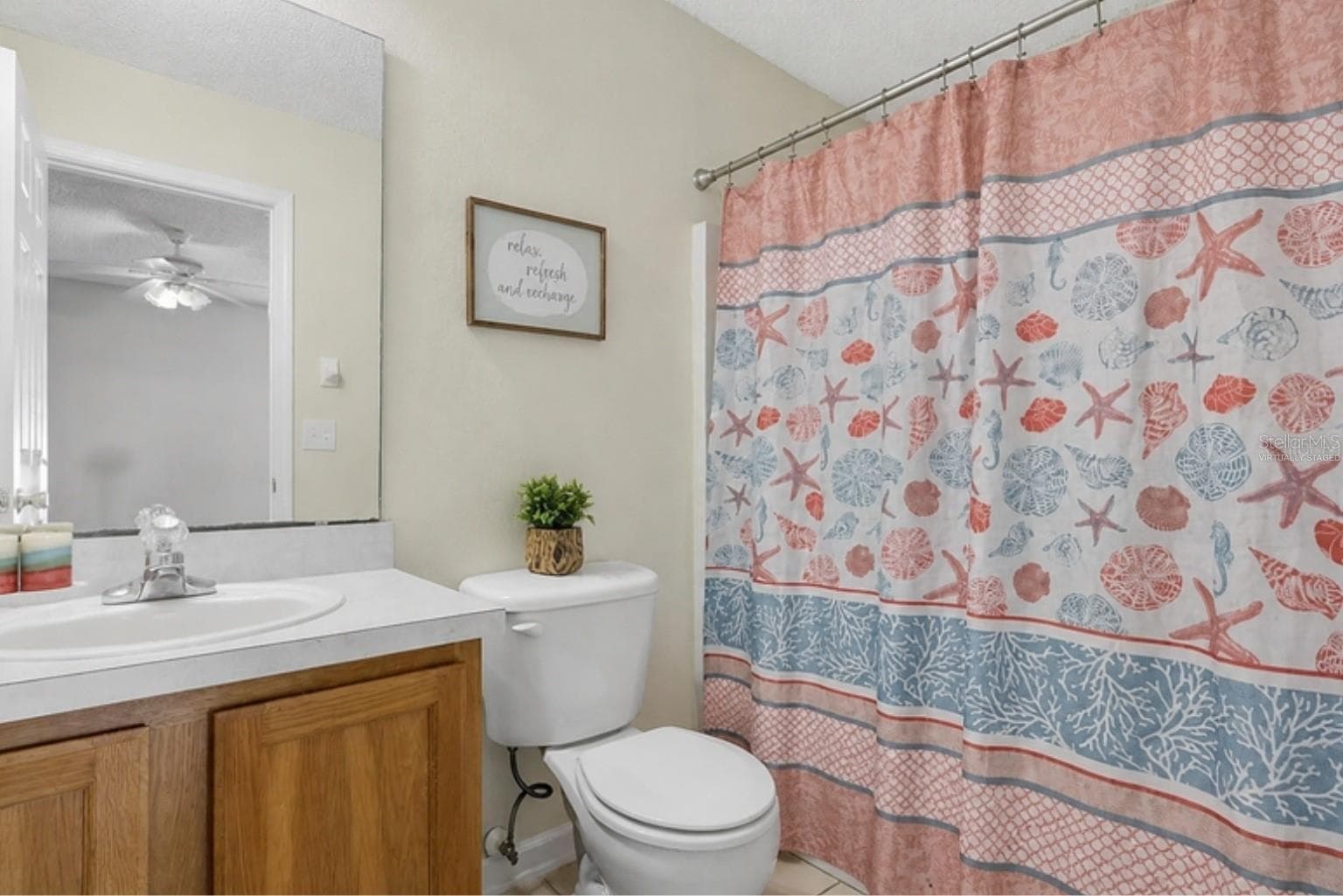 Virtually staged with the home's actual furniture - primary bath - 3 LOUVET LN, PALM COAST