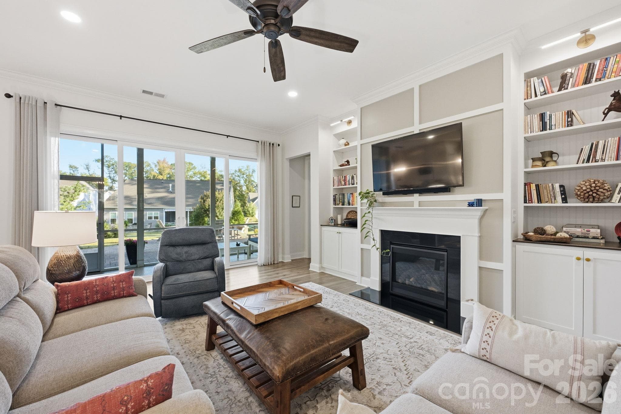 Flow from the living area onto the porch through sliding glass doors - 4025 Pollock View, Mount Holly