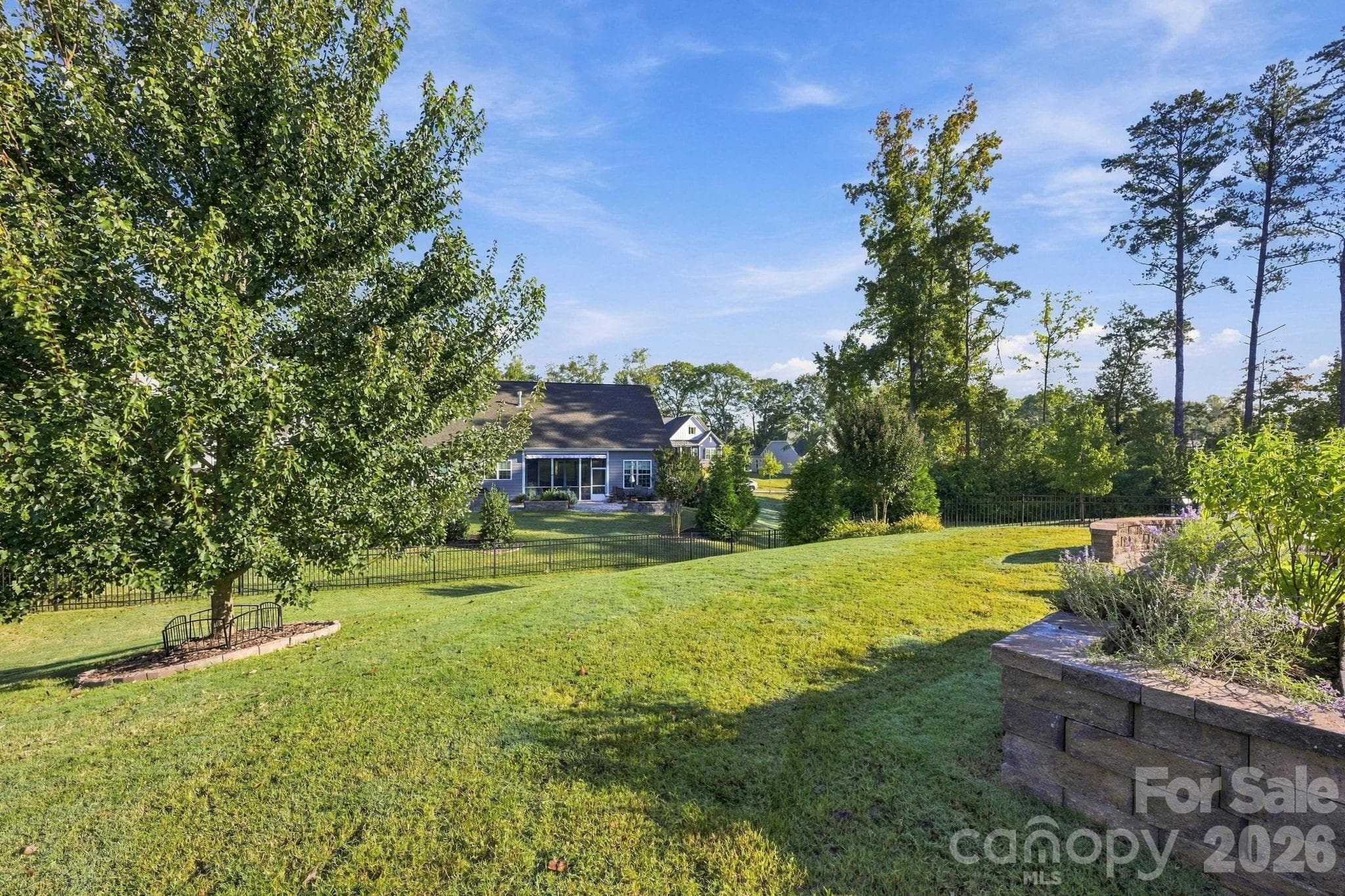 Professionally landscaped fenced yard - 4025 Pollock View, Mount Holly