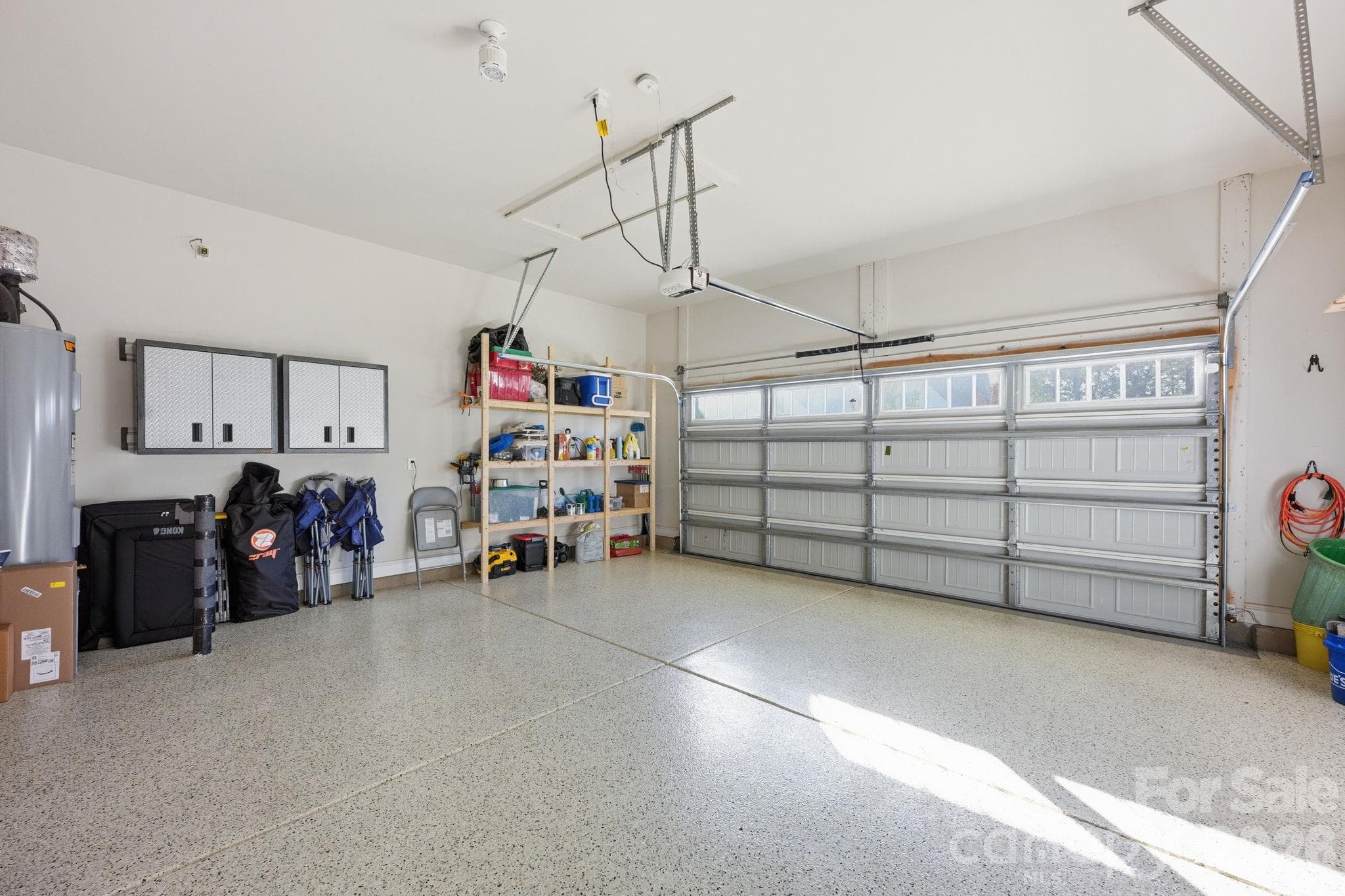 Epoxy coating in generous main, two car garage - 4025 Pollock View, Mount Holly