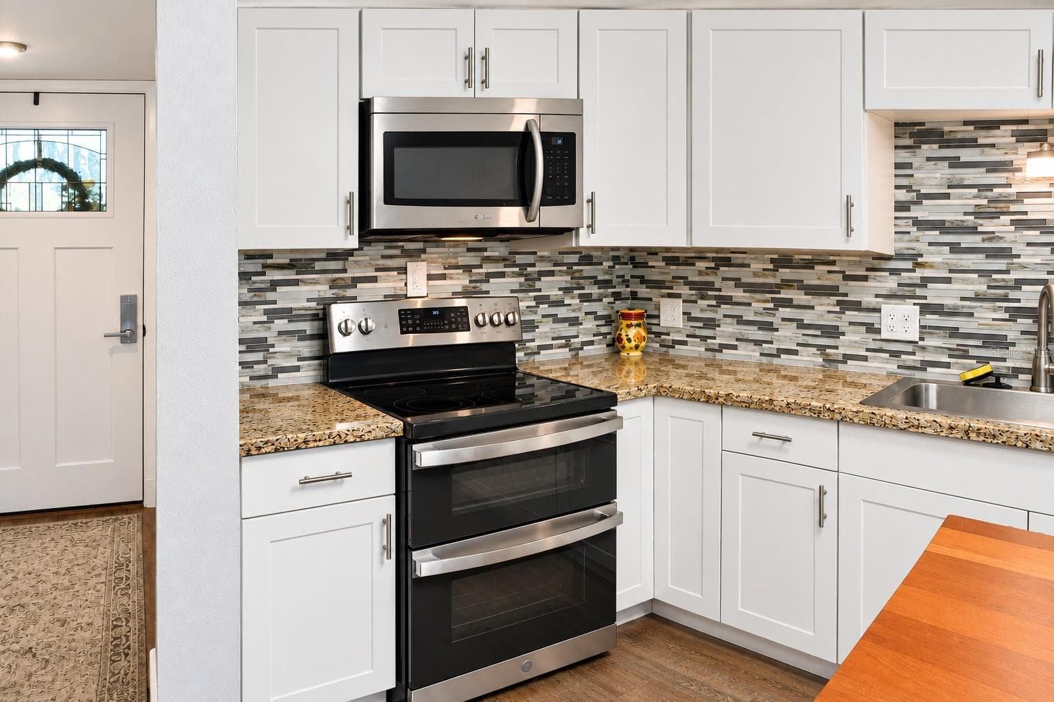 Kitchen & entry - 2329 RIVER RIDGE RD #13, DELAND