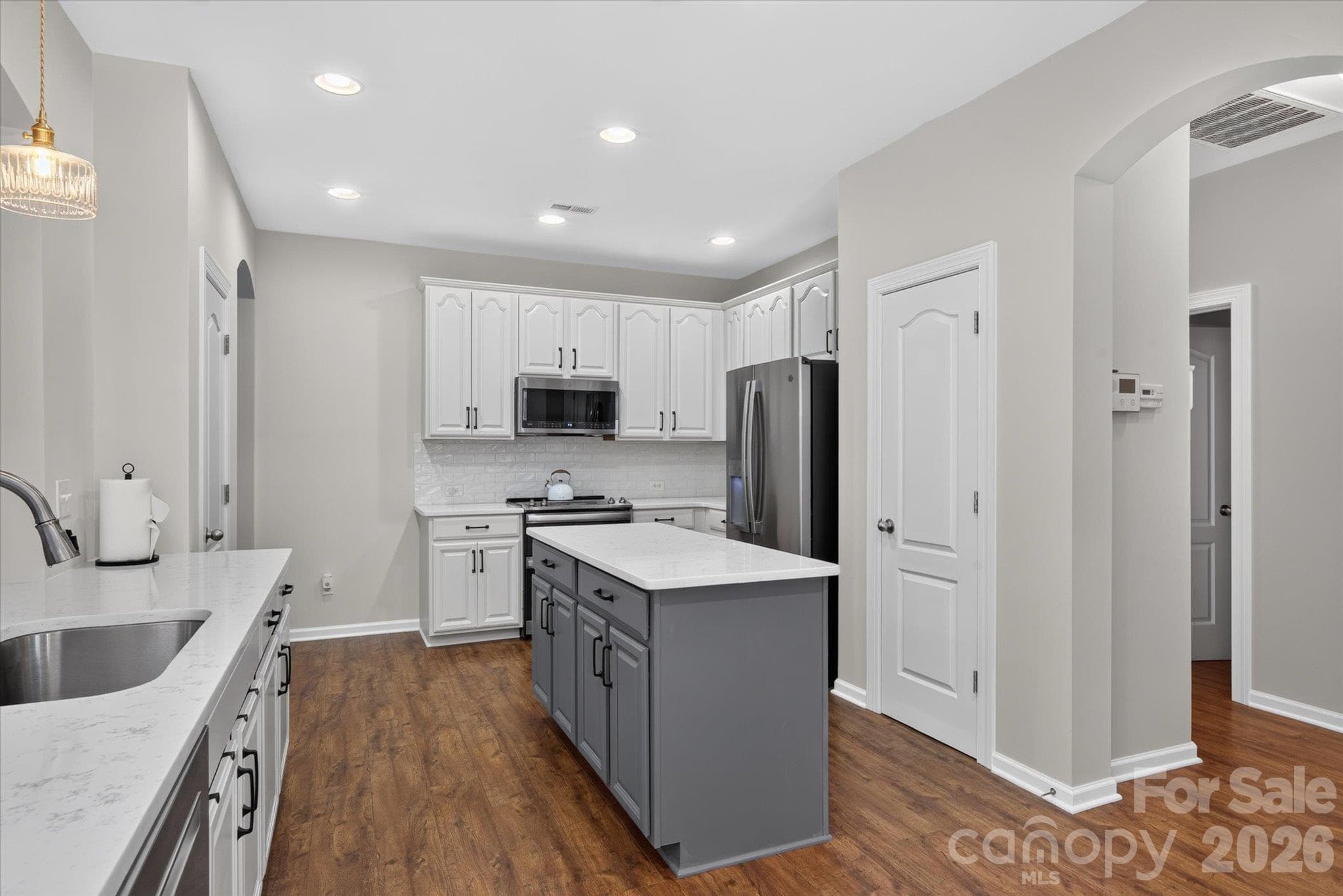 Kitchen island and quartz counters - 6107 Cactus Valley Road, Charlotte