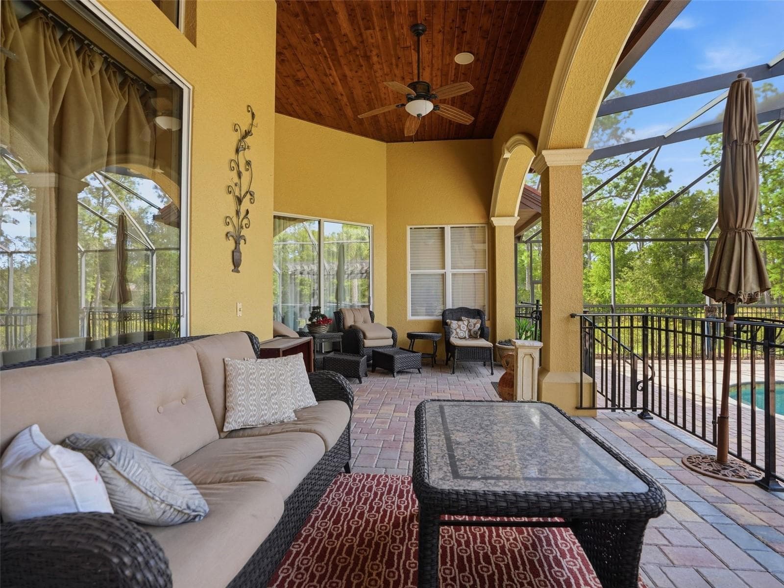 The architecture on the home is in every detail! Triple arches, wood plank tongue and grove ceilings! - 9313 HERNANDO RIDGE RD, WEEKI WACHEE