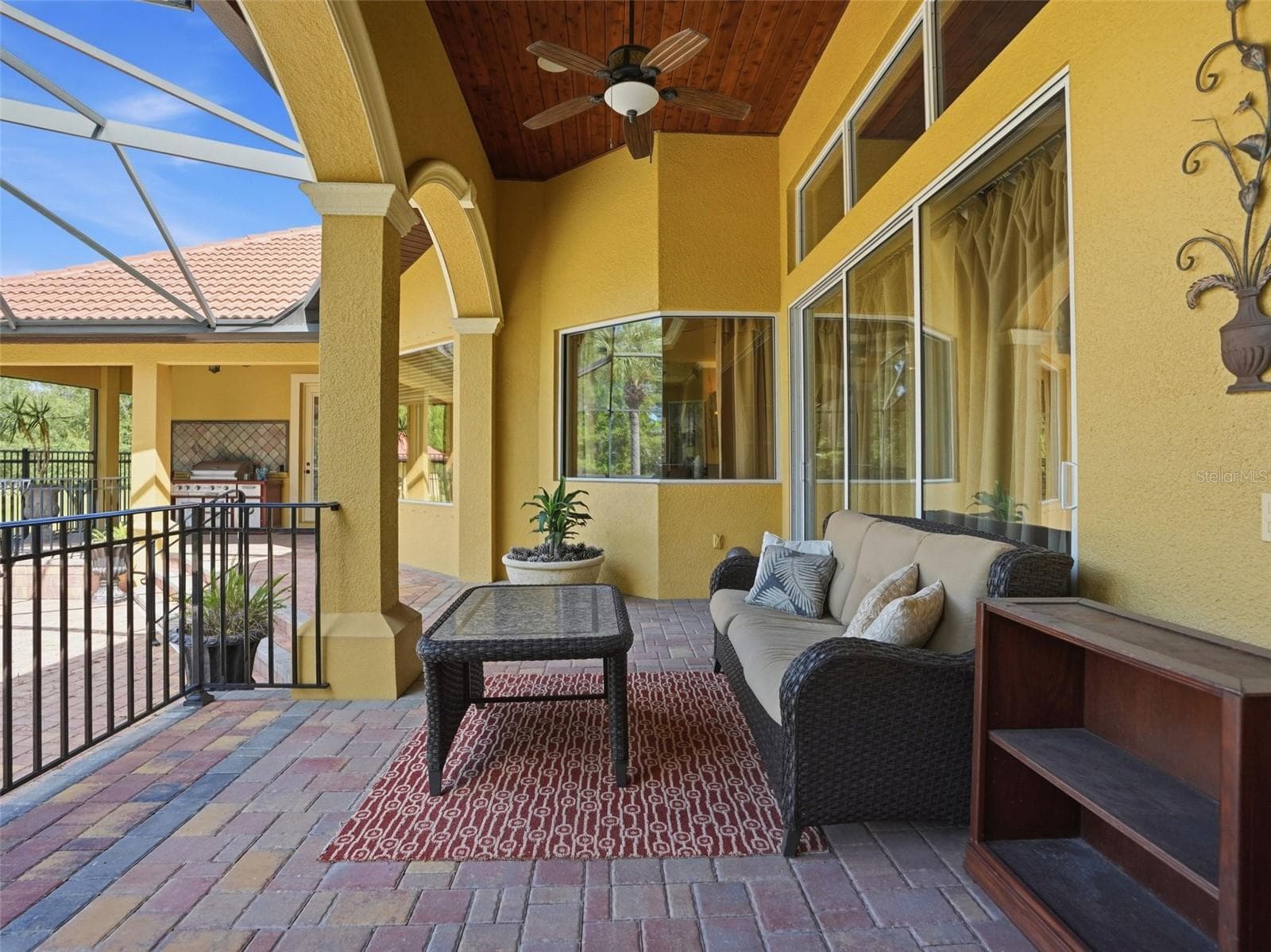 Outdoor covered lanai overlooking the pool to enjoy your Florida lifestyle! Complete privacy from any neighbors! - 9313 HERNANDO RIDGE RD, WEEKI WACHEE