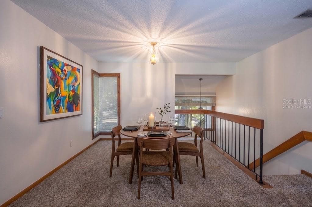 VIRTUALLY STAGED: Dining Room - 12 FAIRWAYS CIR #12, PALM COAST