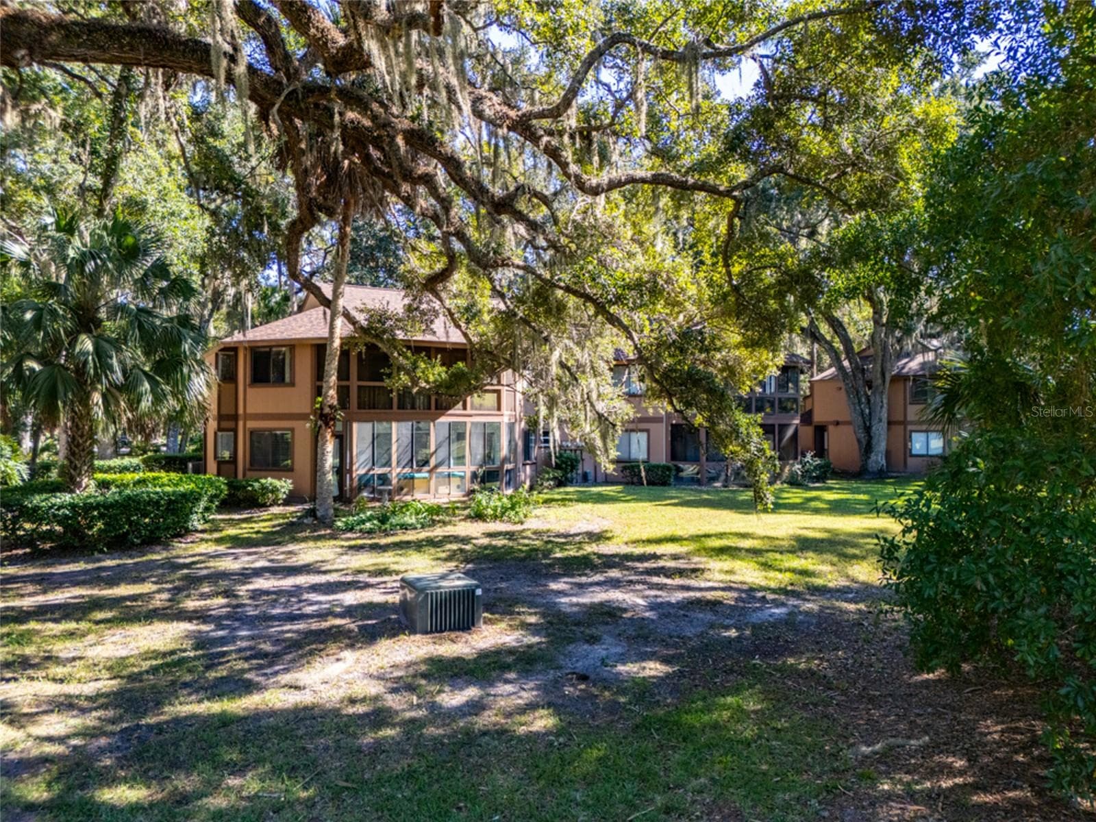Building Is Nestled In The Trees - 12 FAIRWAYS CIR #12, PALM COAST