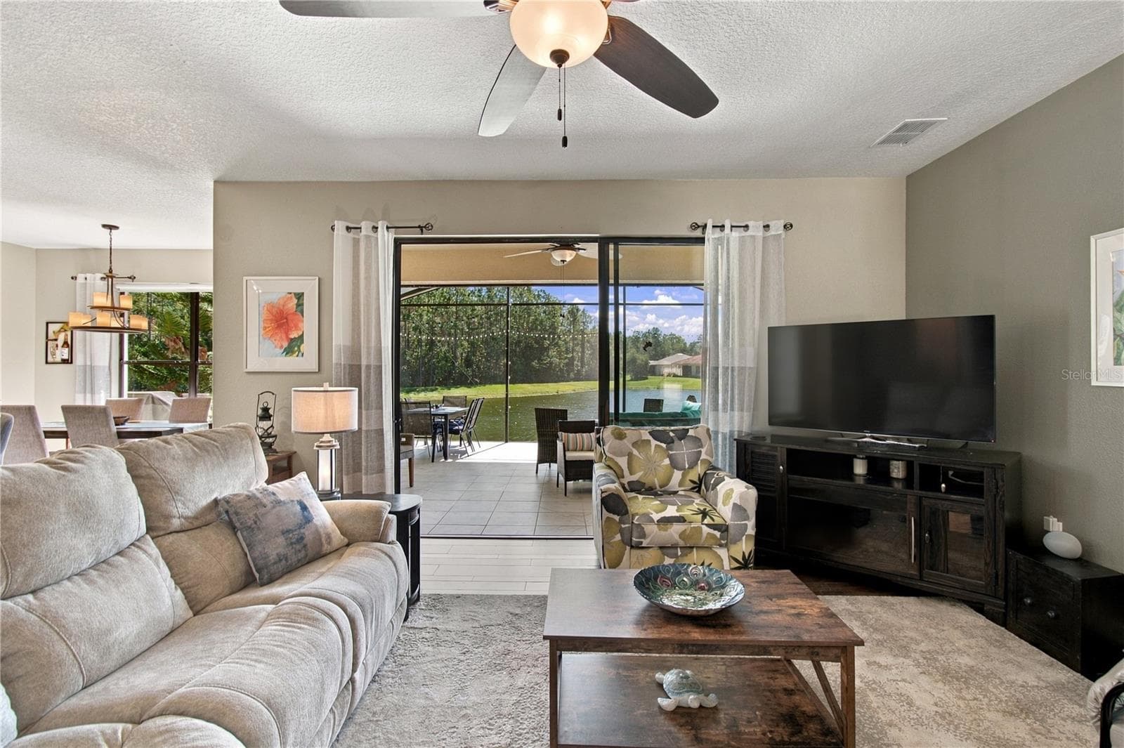 SLIDERS TO ENCLOSED LANAI - 318 LA JOLLA LN, KISSIMMEE