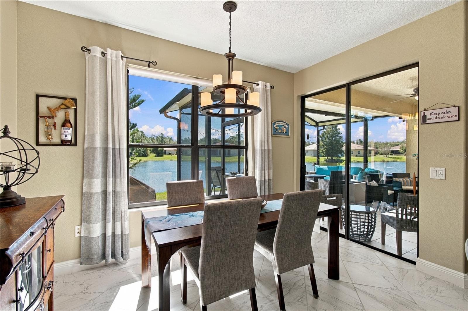 WATER VIEWS FROM DINING ROOM - 318 LA JOLLA LN, KISSIMMEE