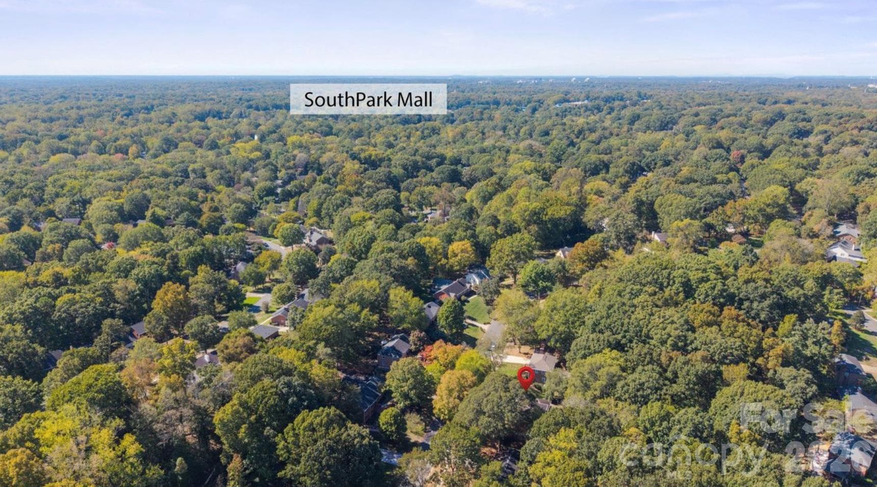 The red pin is dropped over the house showing the proximity to South Park Mall area just under 5 miles away. - 6626 Rocky Falls Road, Charlotte