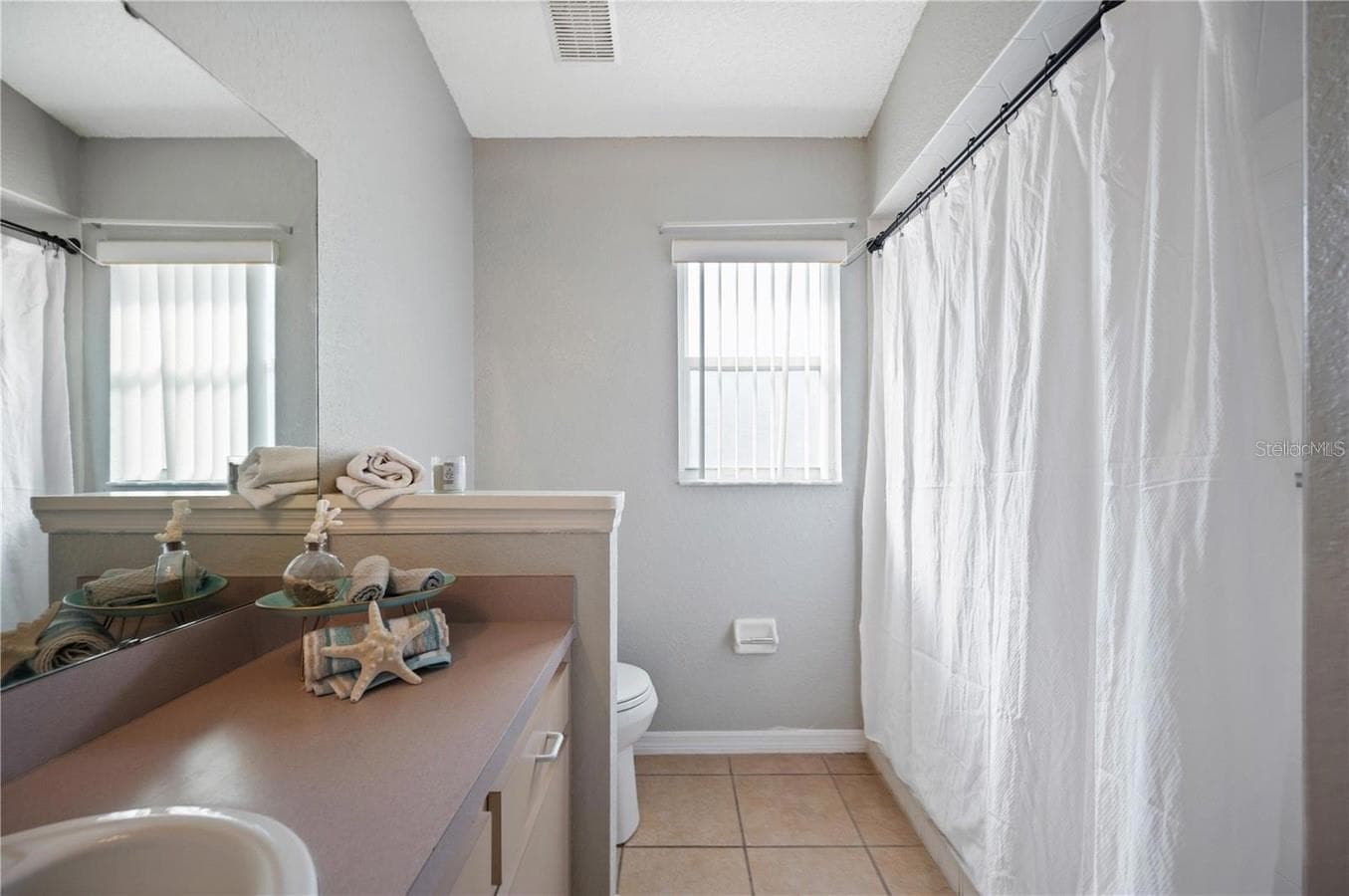 Primary bedroom suite's bathroom. - 2671 PINE BRUSH DR, LAKELAND