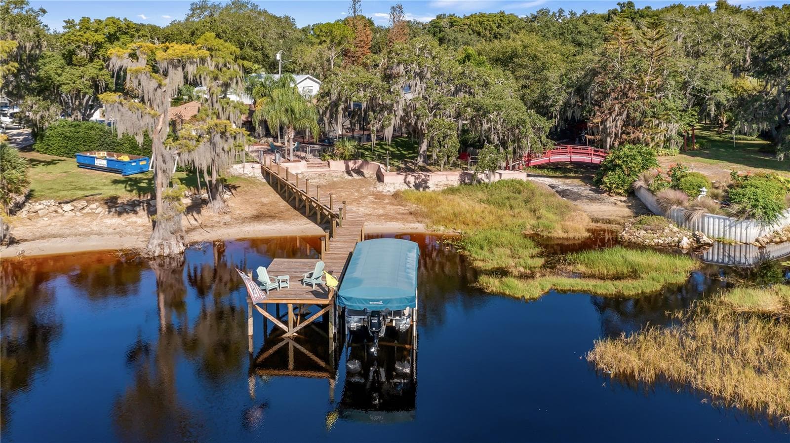 Aerial from lake Minnehaha of 1730 Nita Place Clermont, FLResurfaced Seawall in 2026, Renovated Dock platform 10/2022, Renovated Dock walkway 5/2026 - 1730 NITA PL, CLERMONT