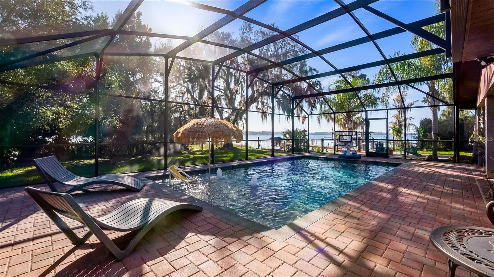 2 sets of sliders from great room to rear covered porch/pool added in late 2022 - 1730 NITA PL, CLERMONT