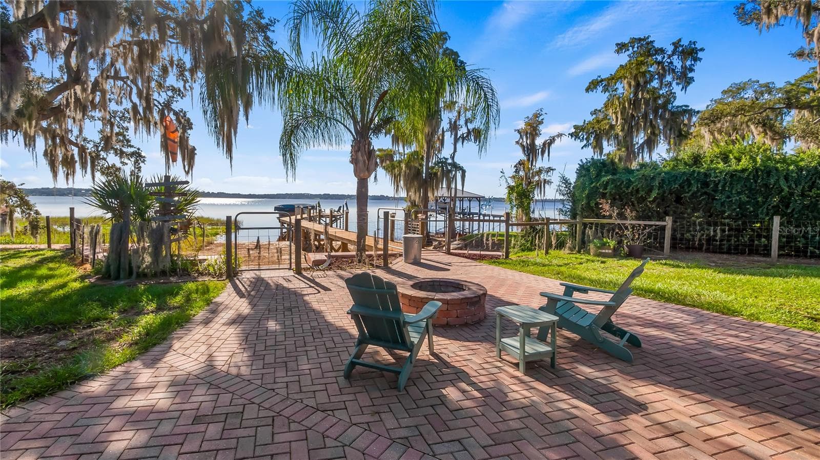 Fire pit between main home/pool area and Lake Minnehaha - 1730 NITA PL, CLERMONT