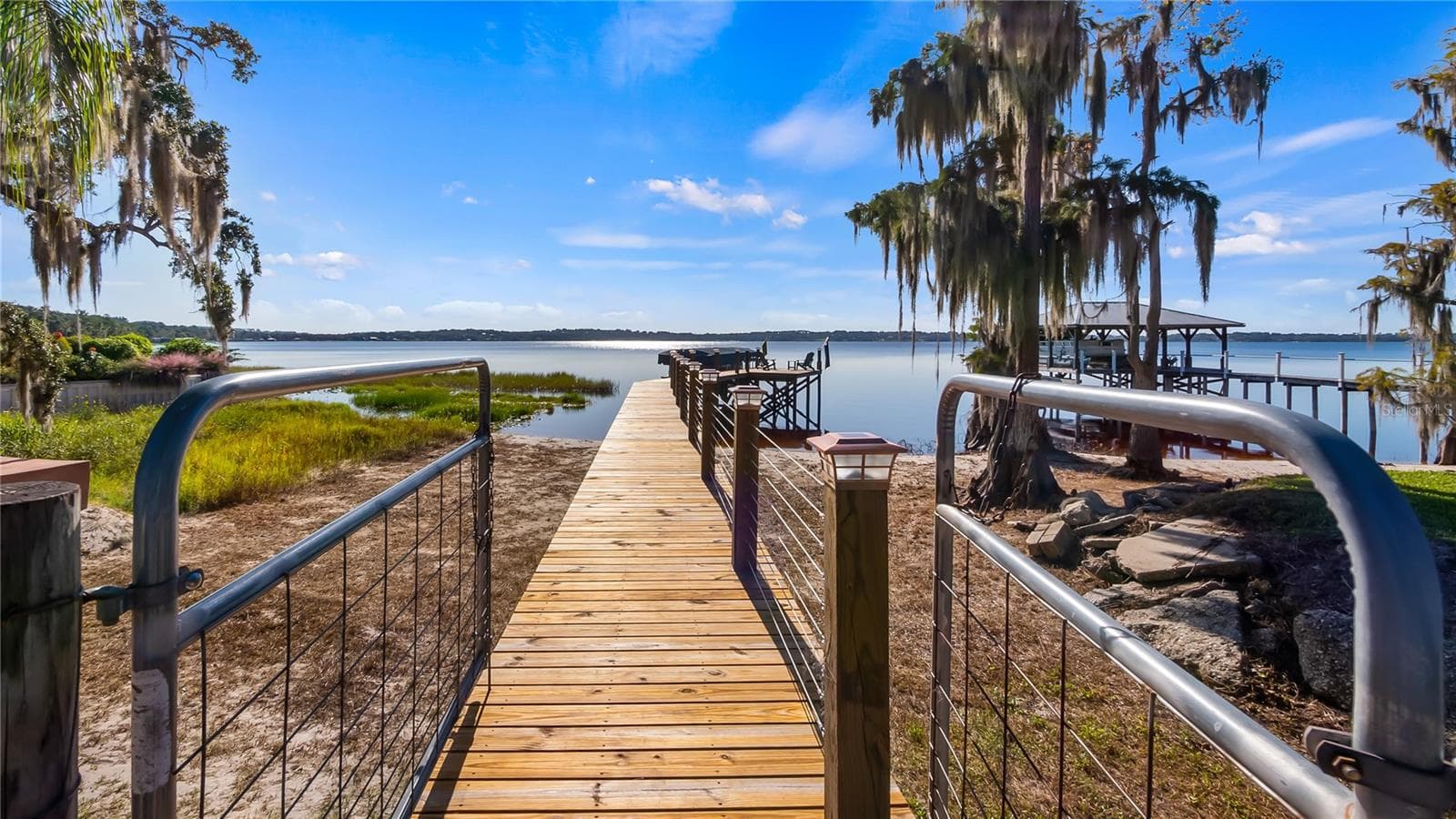 Resurfaced Seawall in 2026, Renovated Dock platform 10/2022, Renovated Dock walkway 5/2026 - 1730 NITA PL, CLERMONT