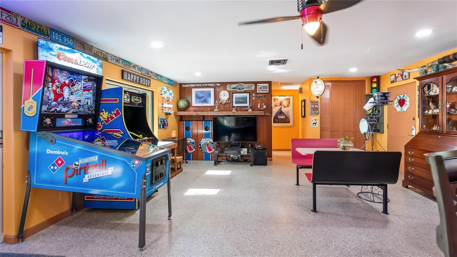 Main Home - Great room/kitchen/living room combo: Living room used as gathering space for game room fun. Two Sliders go out to covered back porch and screened in pool - 1730 NITA PL, CLERMONT