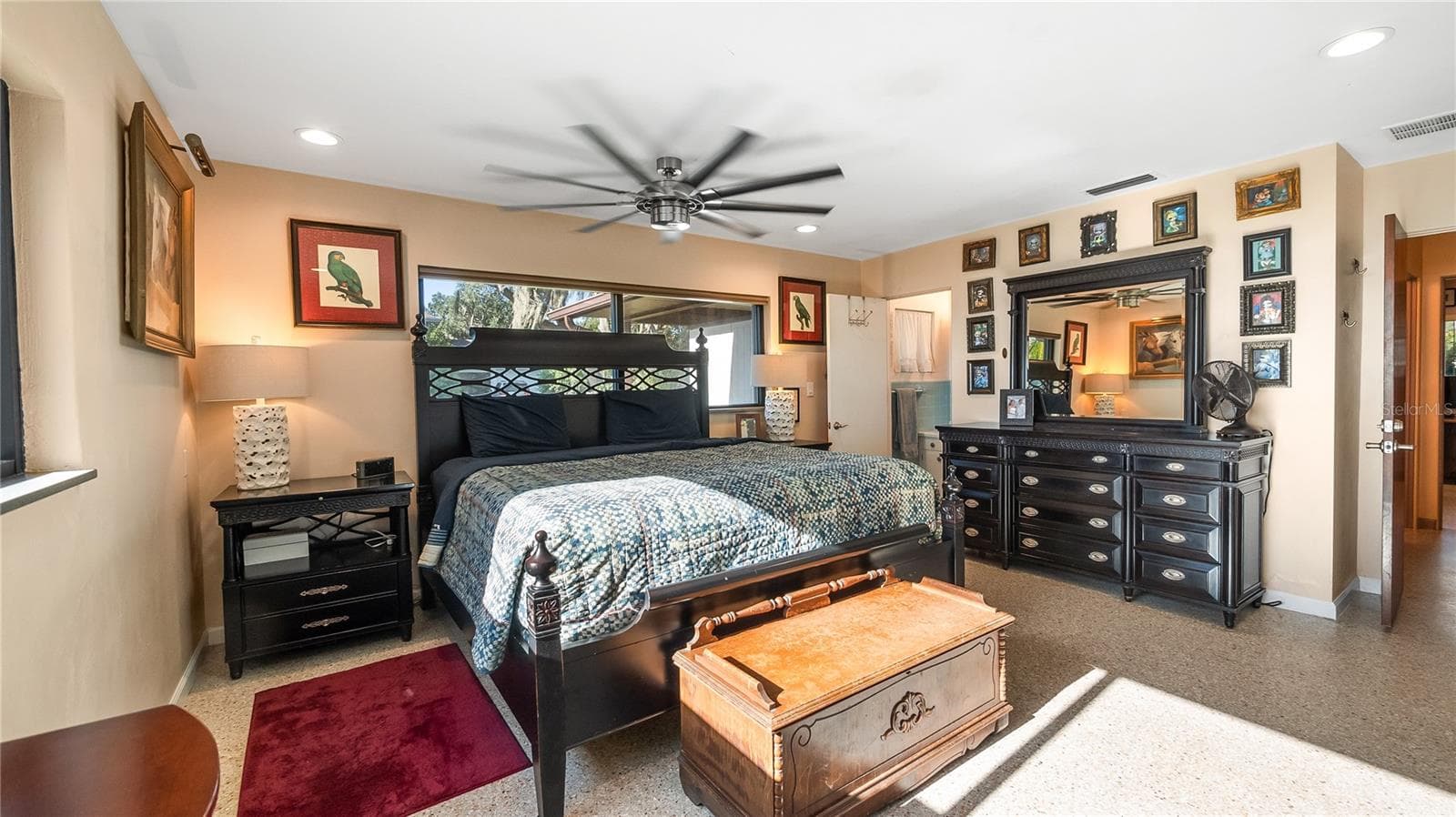 Primary with private bath and amazing lakefront views. Private exit to screened in back porch to back yard - 1730 NITA PL, CLERMONT