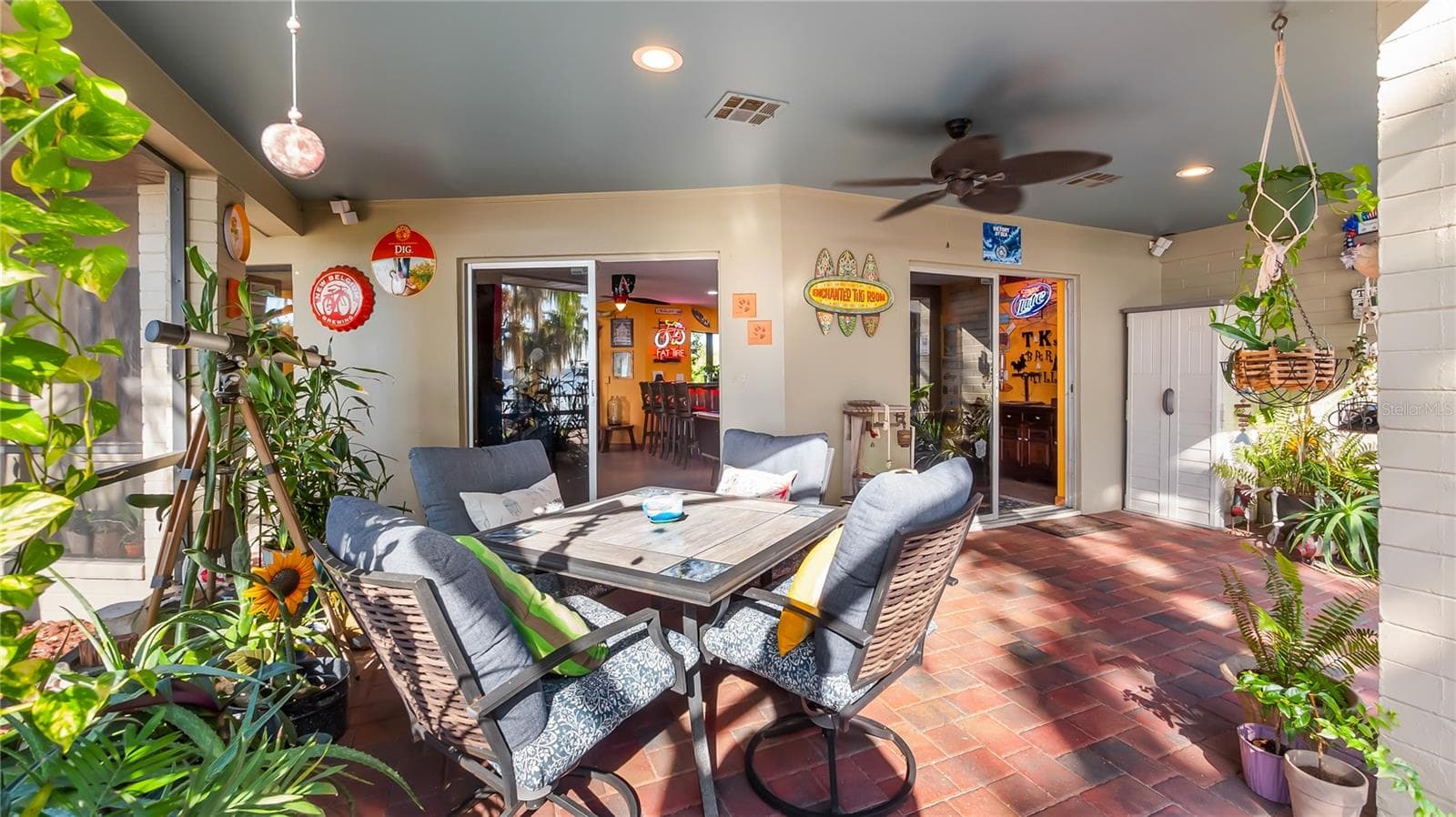 2 sets of sliders from great room to rear covered porch/pool added in late 2022 - 1730 NITA PL, CLERMONT